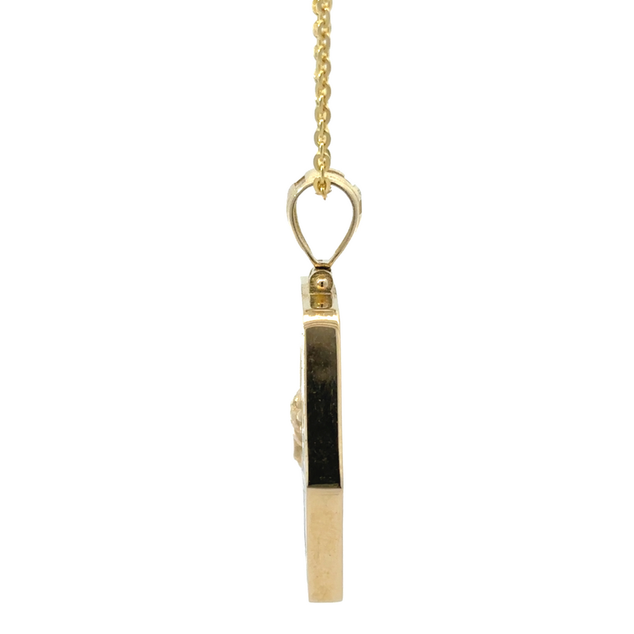 Medium-sized gold pendant combining 14k white and yellow gold