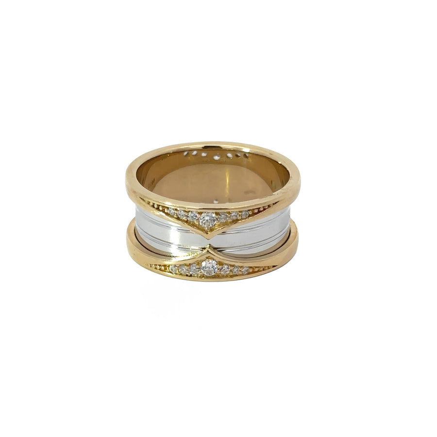 Close-up of CZ center stone on two-tone gold band