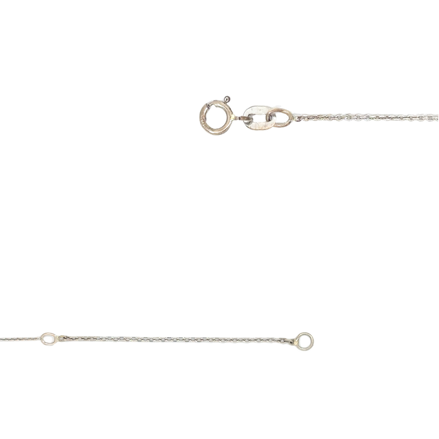 Flat lay of 14k white gold necklace with adjustable length feature