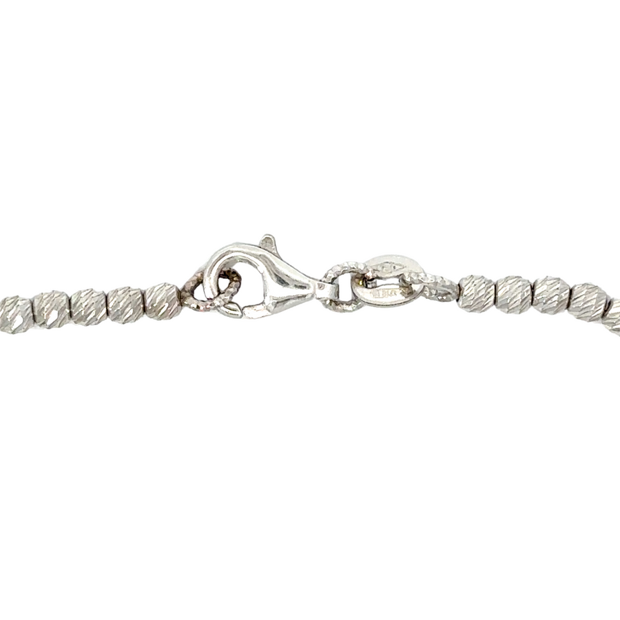 Bracelet worn by man with casual attire