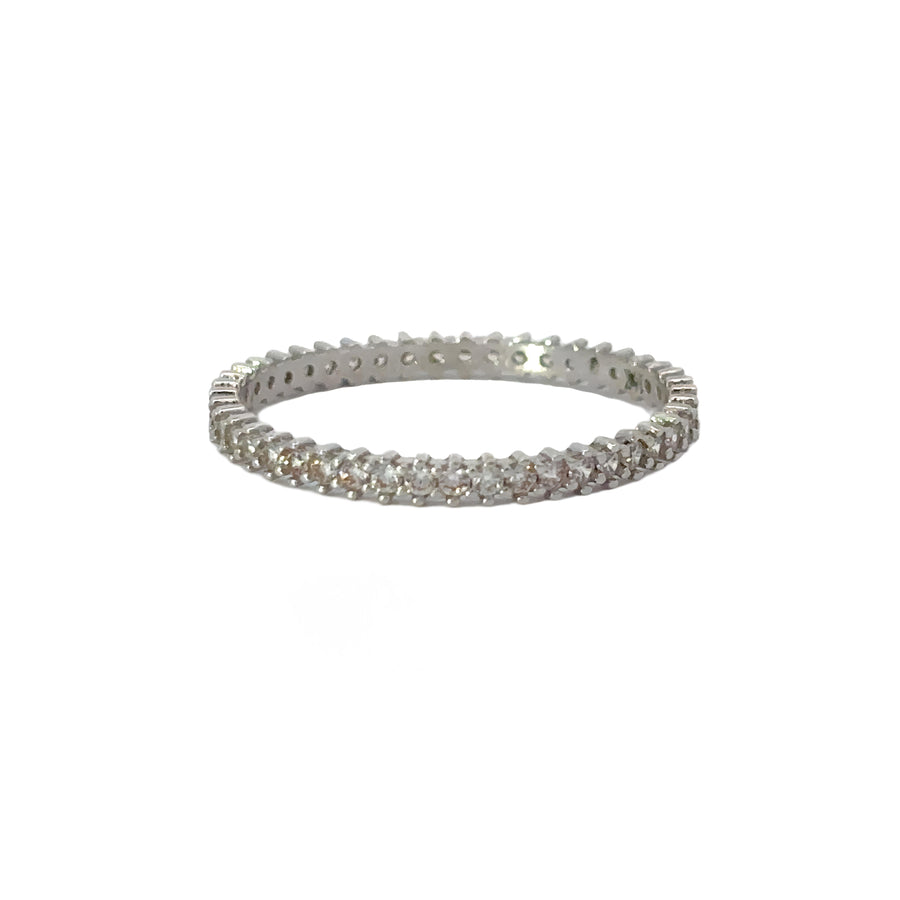 Close-up of 14k white gold ring with full CZ stone band