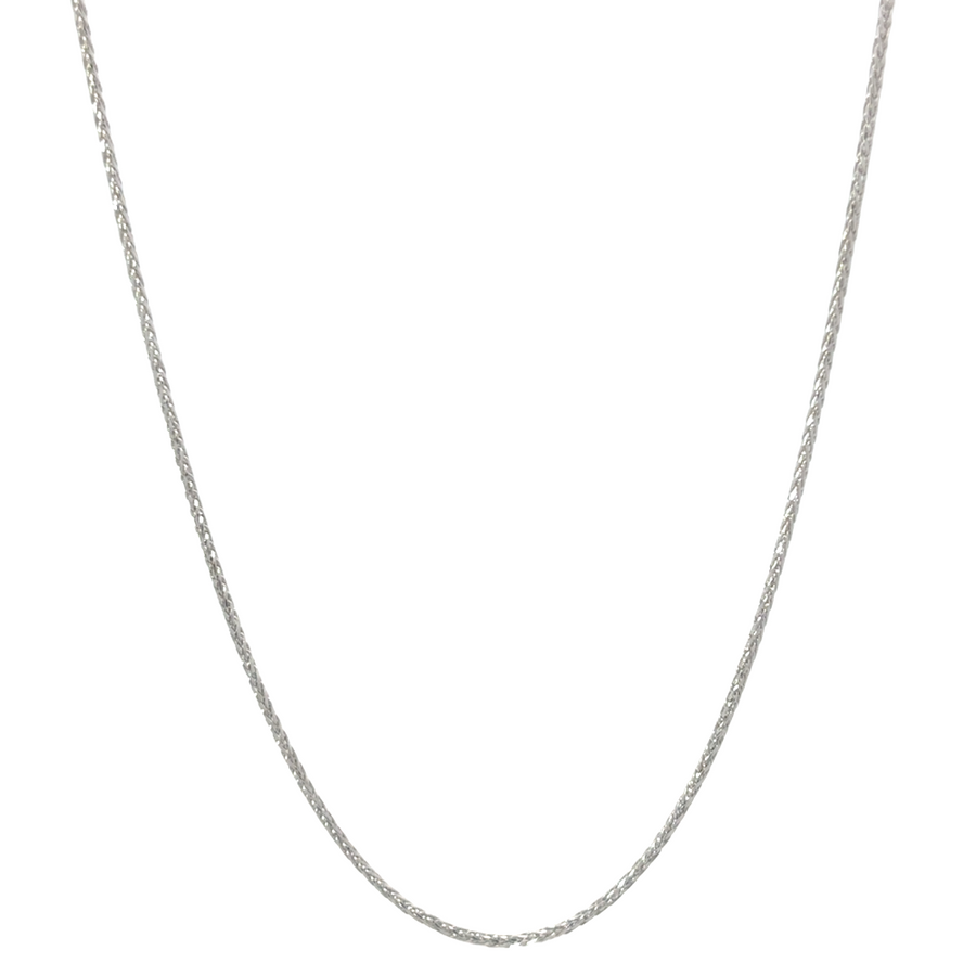 Close-up of 14k white gold chain on neutral background showing fine detail