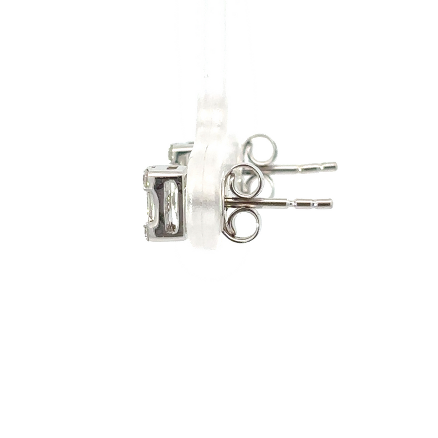 Side view of sleek 14k white gold earrings with diamond accents