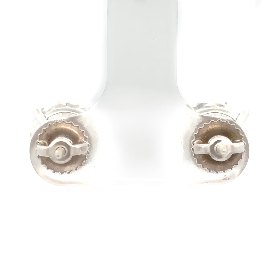Woman wearing 14k white gold lab diamond earrings