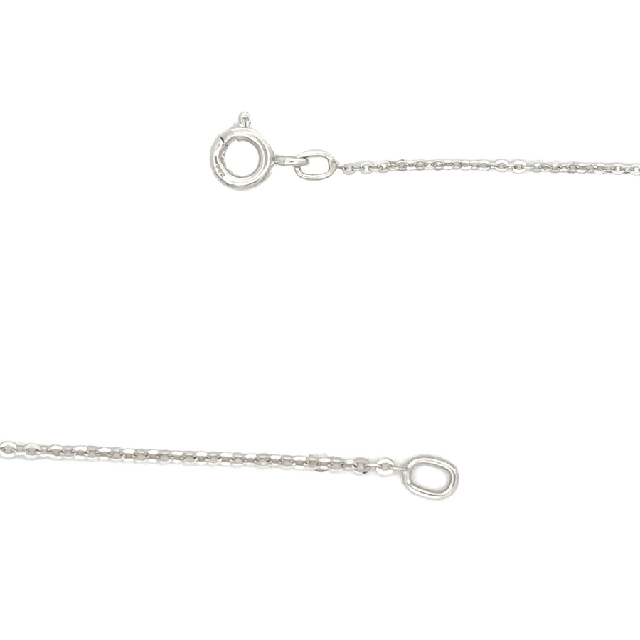 Delicate necklace with triple stones on display stand