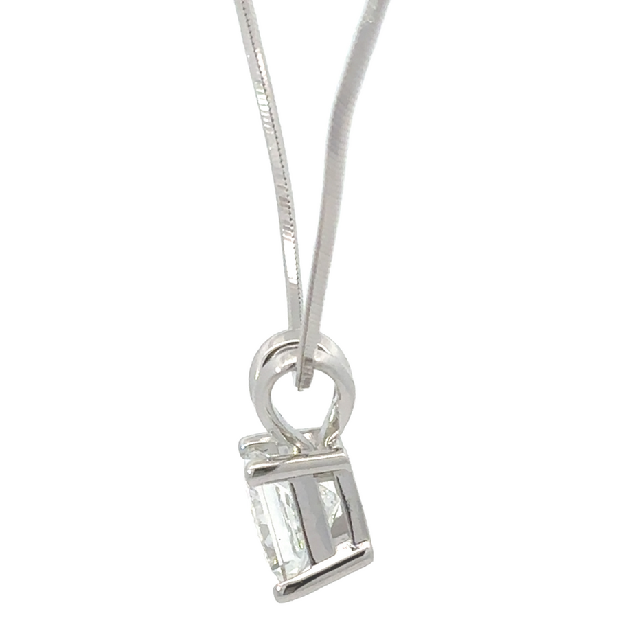 Side view of 14k white gold pendant highlighting the diamond’s sparkle and clarity