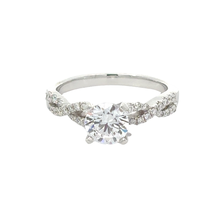 Close-up of women’s white gold ring with cubic zirconia and diamonds