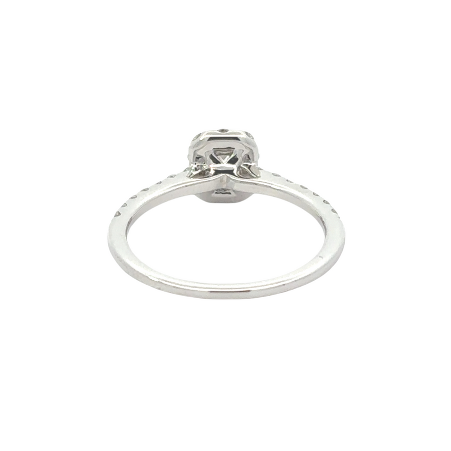 Side profile of white gold ring with CZ and diamond accents
