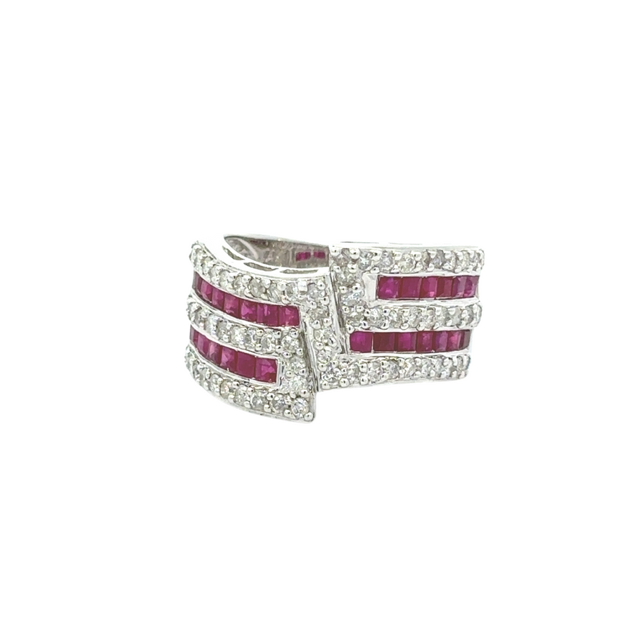 Close-up of ruby center stone with diamond accents on white gold ring