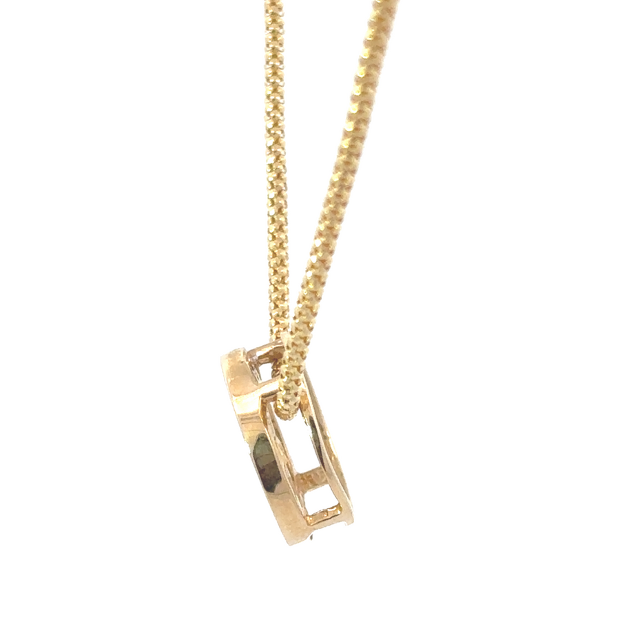 Unisex 14k yellow gold circle pendant with diamonds, perfect for everyday elegance