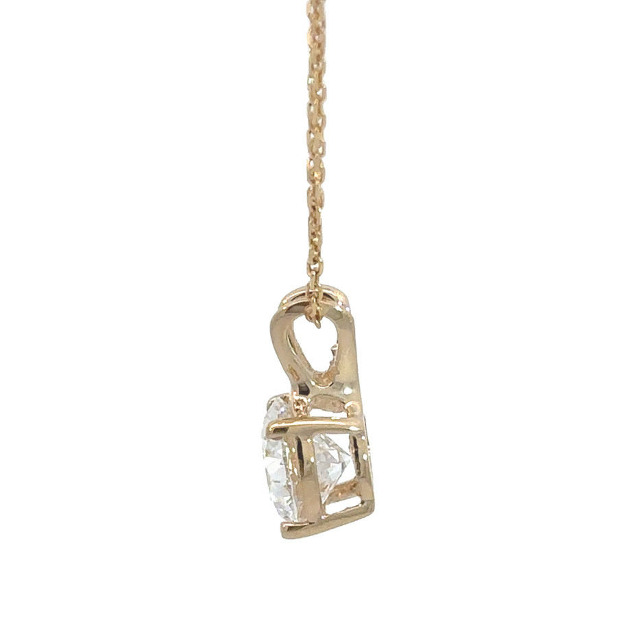 14k yellow gold pendant featuring a brilliant 1.02 CT lab diamond.