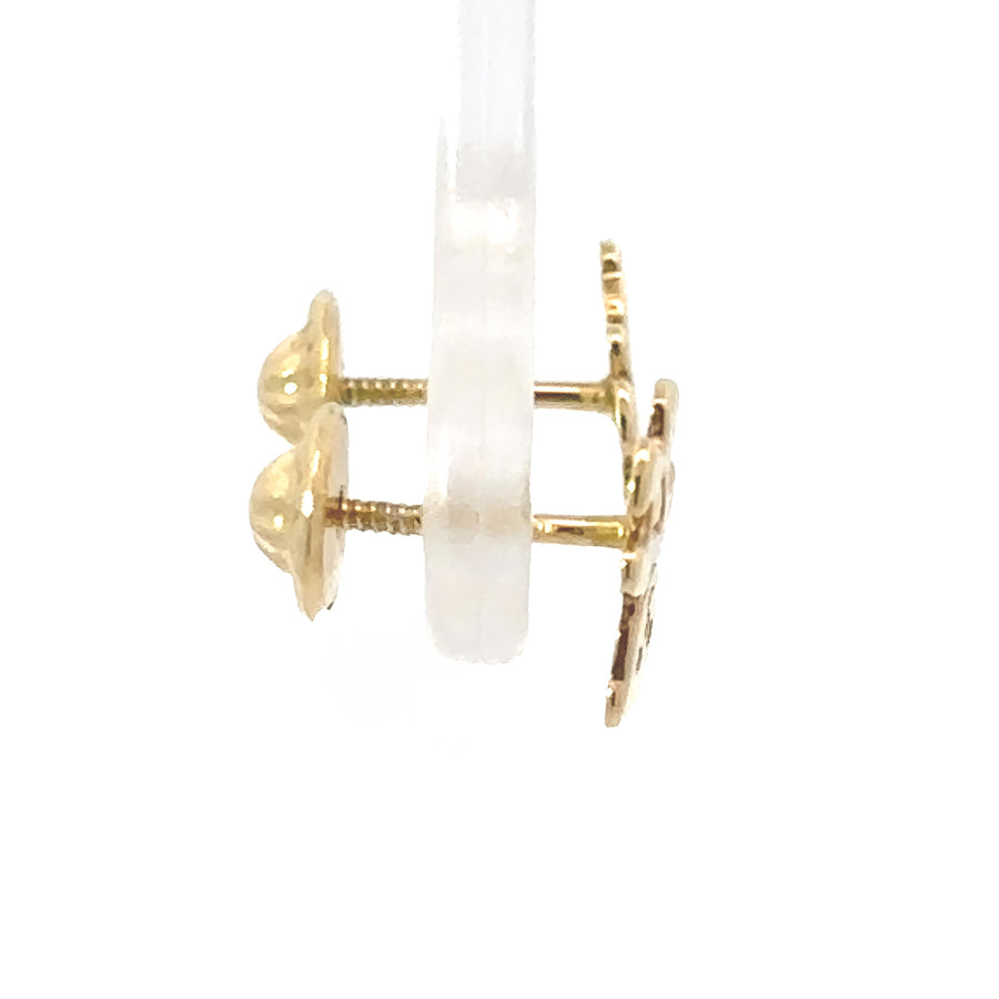 Baby’s first gold earrings with bear design
