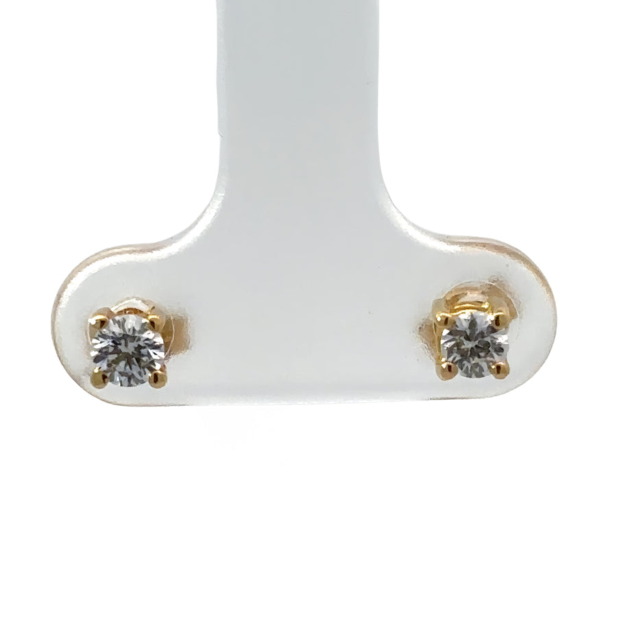Elegant and simple baby earrings on white background