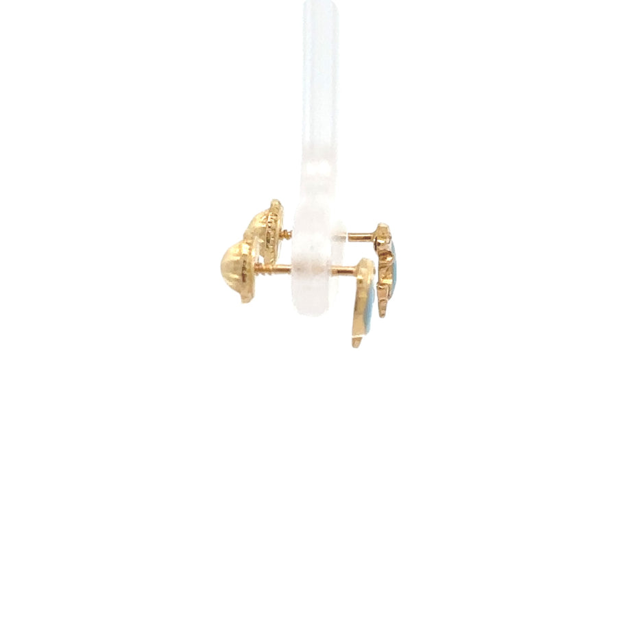 Small gold earrings designed for baby’s delicate ears