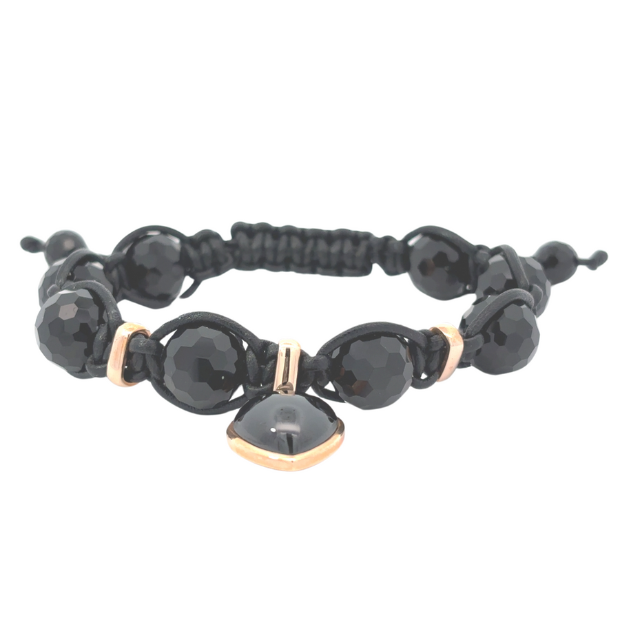 18k gold black bracelet with Aga stone and heart