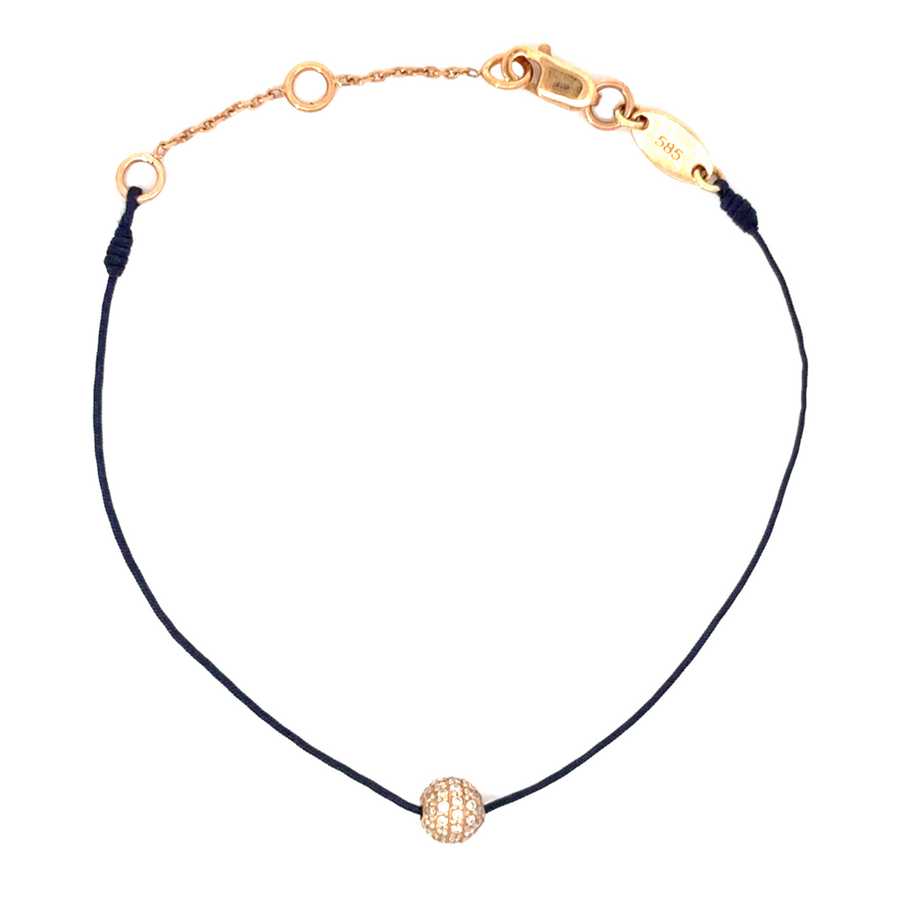 Close-up of the 18k gold blue bracelet showing its brilliant gold finish and vibrant blue detail.
