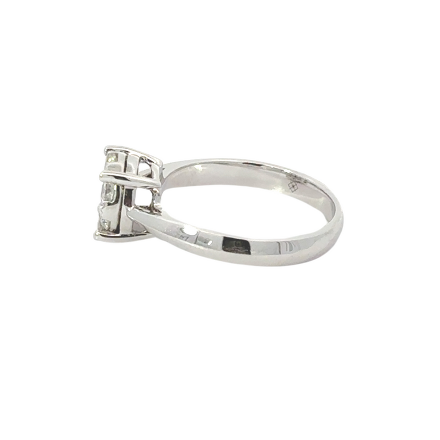 Side view of diamond ring in 18k gold size 6.5