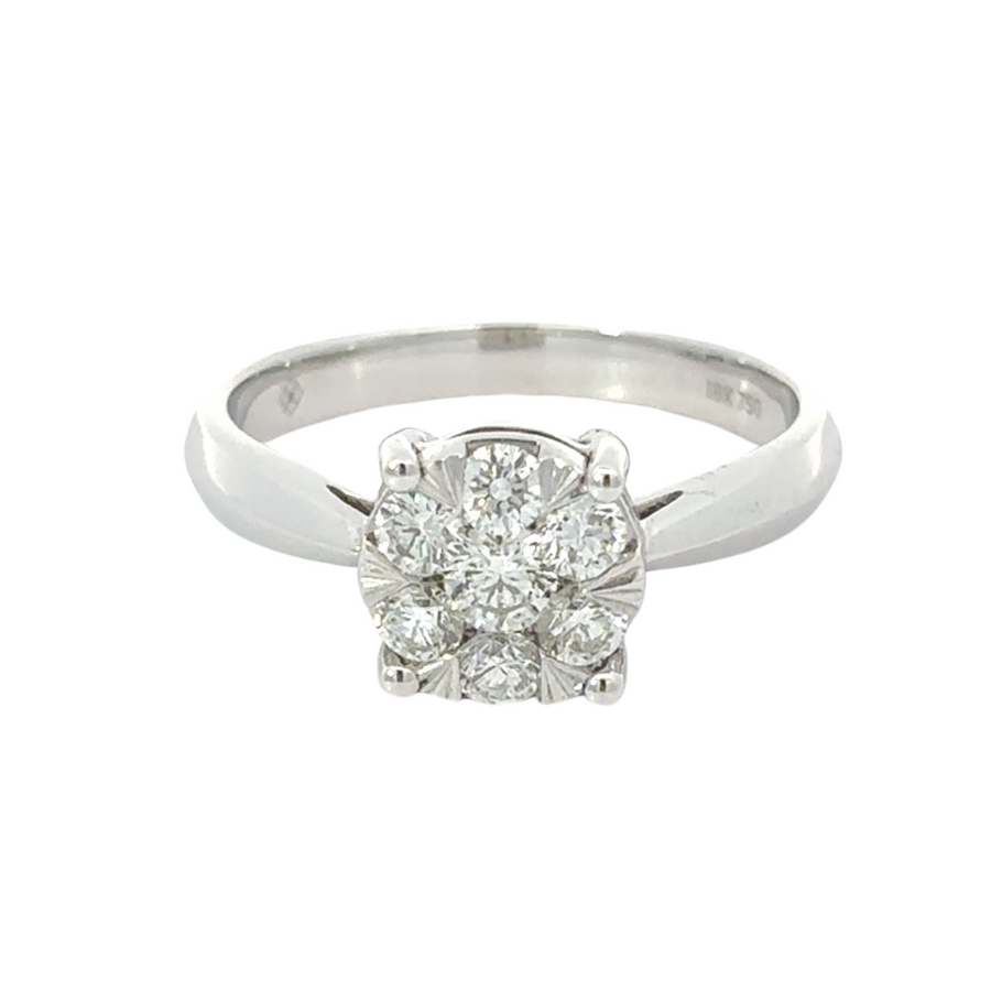 Polished 18k gold ring with brilliant diamonds on white background