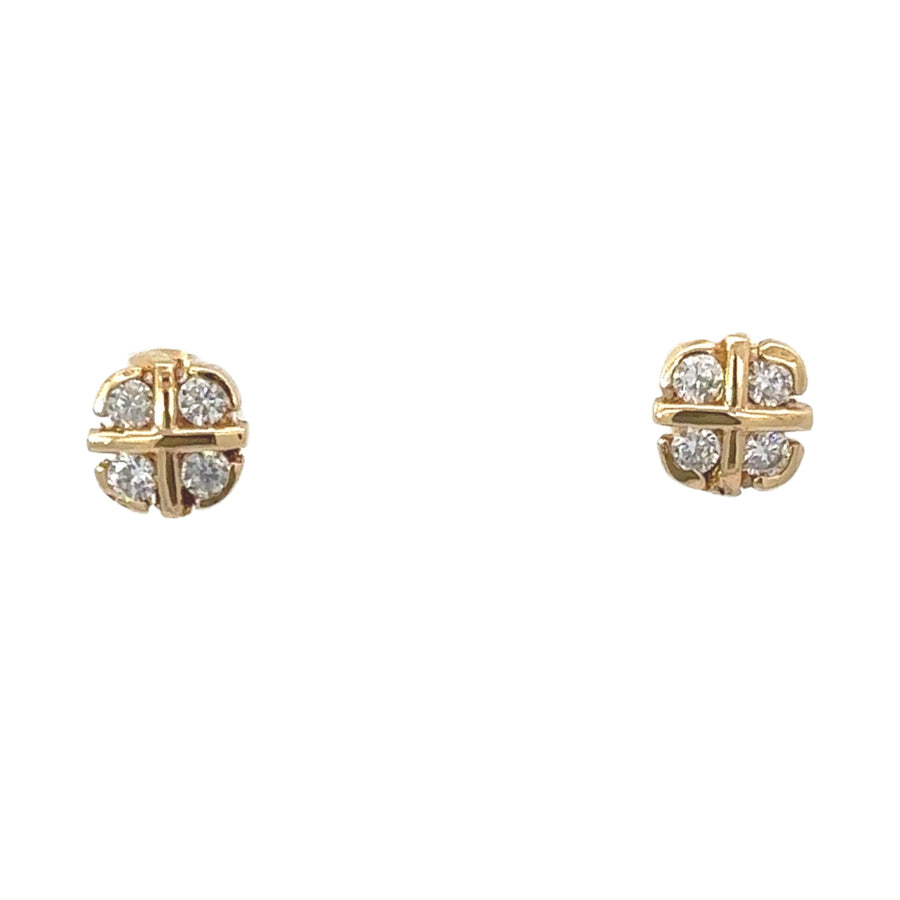 Delicate 18k gold studs designed for babies