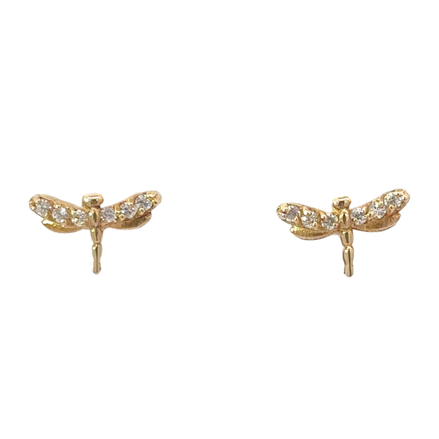 Close-up of classic gold earrings for baby girls