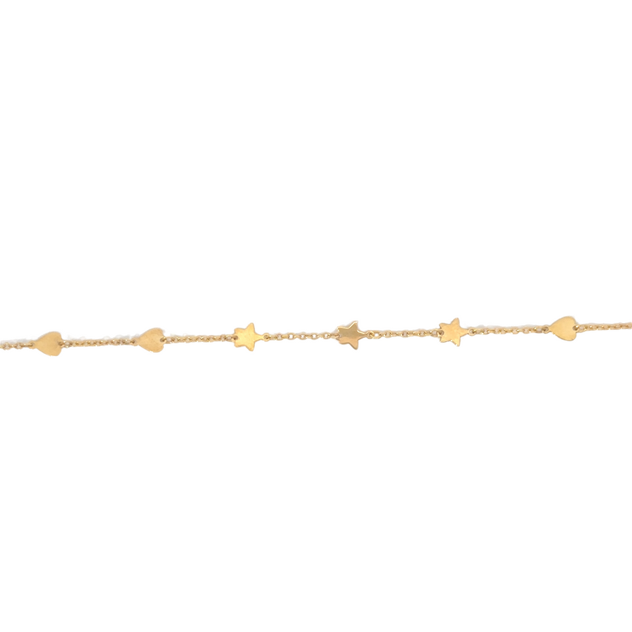 Model wearing 18k gold heart and star necklace with casual outfit