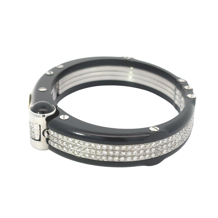 Close-up of diamond detailing on gold bracelet for men
