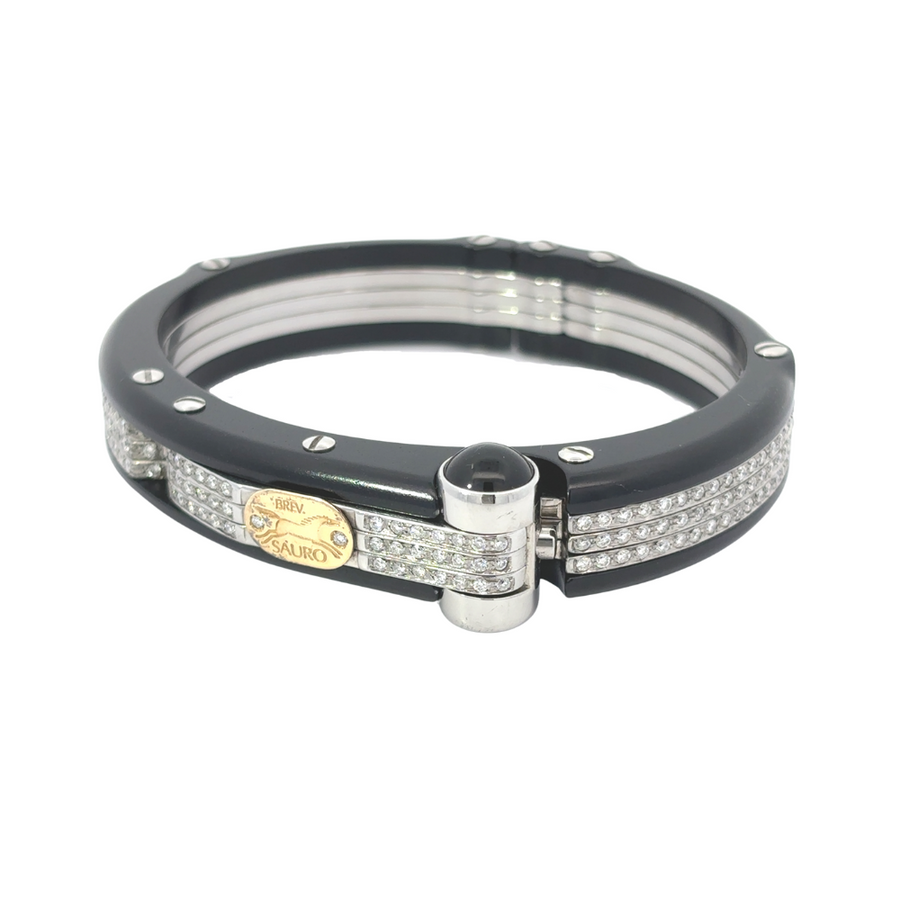 18k gold men’s bracelet with diamond accents on white background