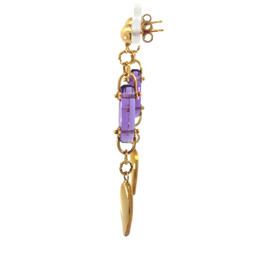Elegant dangle earrings with vibrant purple gemstones