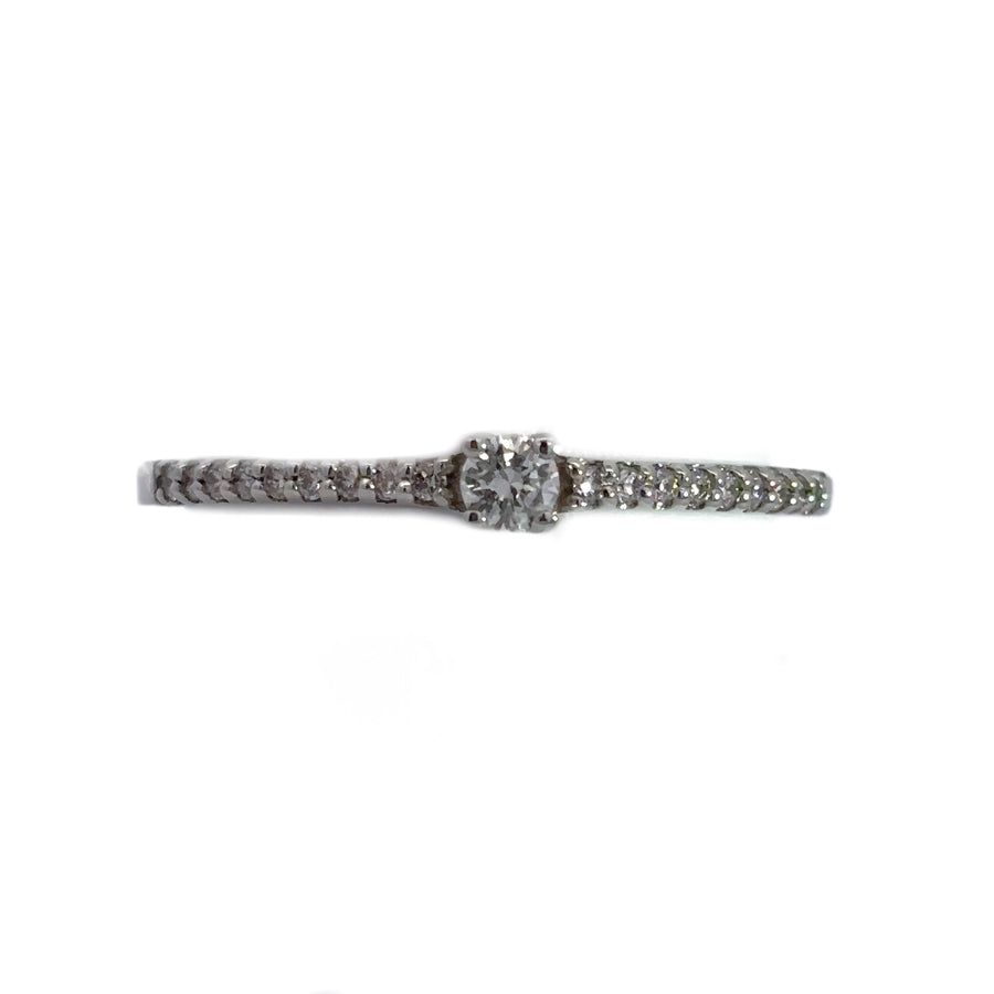 Top view of gold diamond ring on velvet background