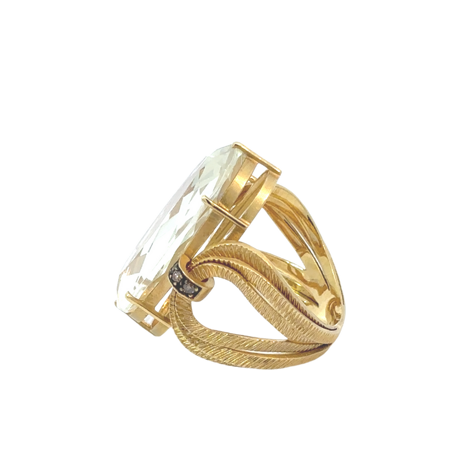 Women's luxury gold ring with gemstone accents