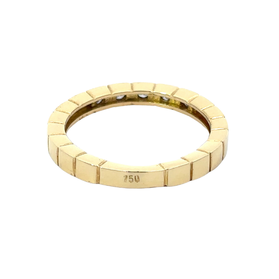Minimalist gold ring with central white stone
