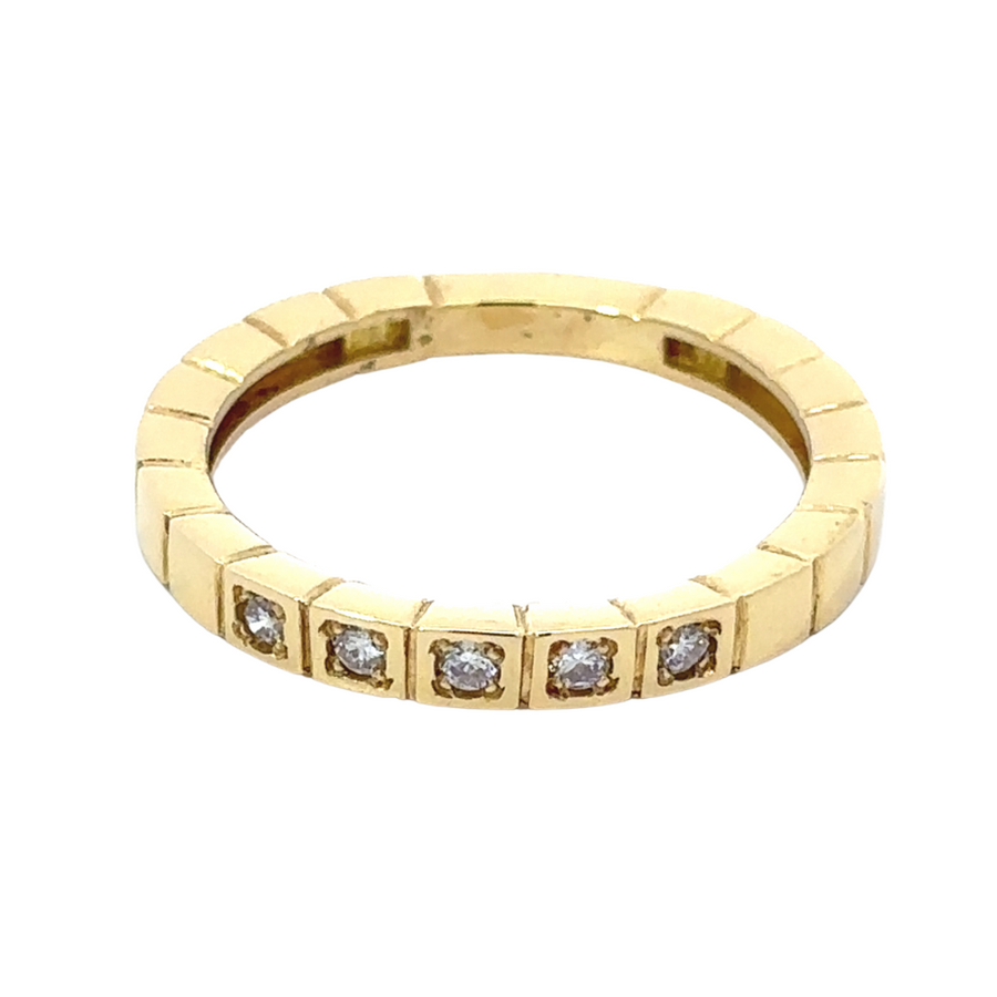 Elegant gold band with single white gemstone