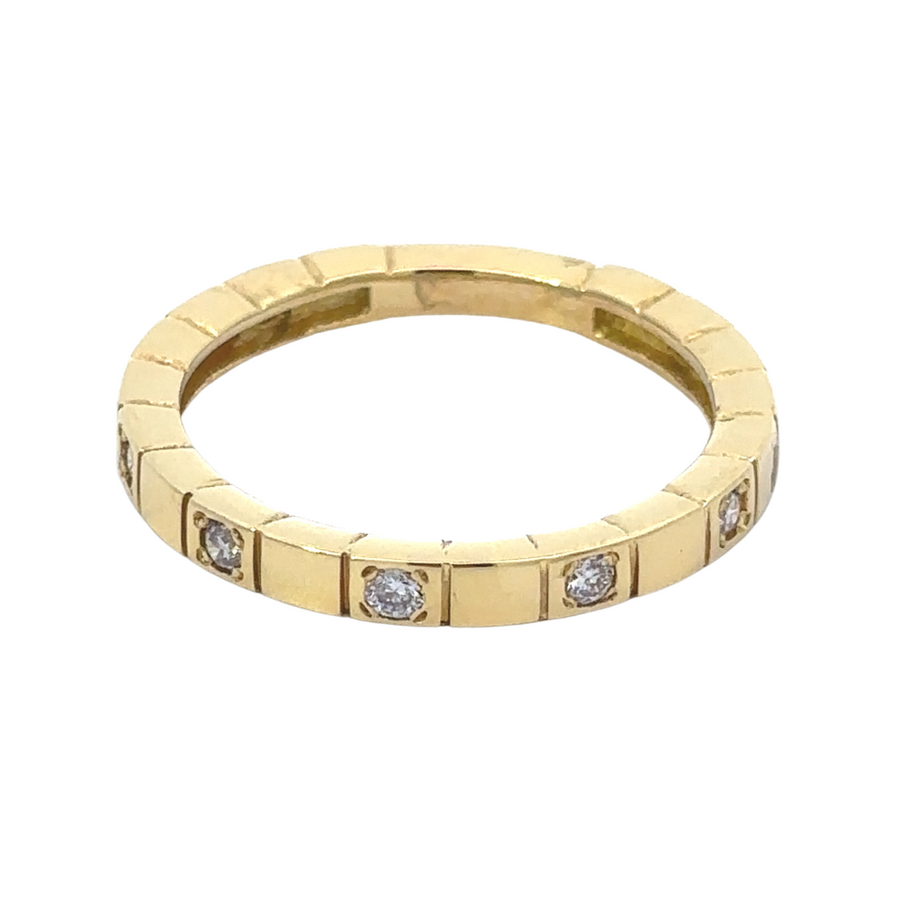 Women’s size 7 gold ring featuring white accents