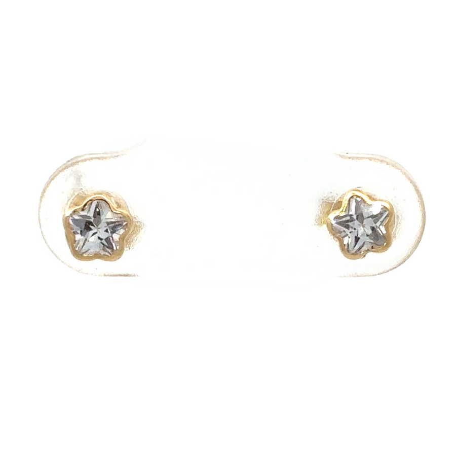 Close-up view of 18k gold stud star earrings with delicate design