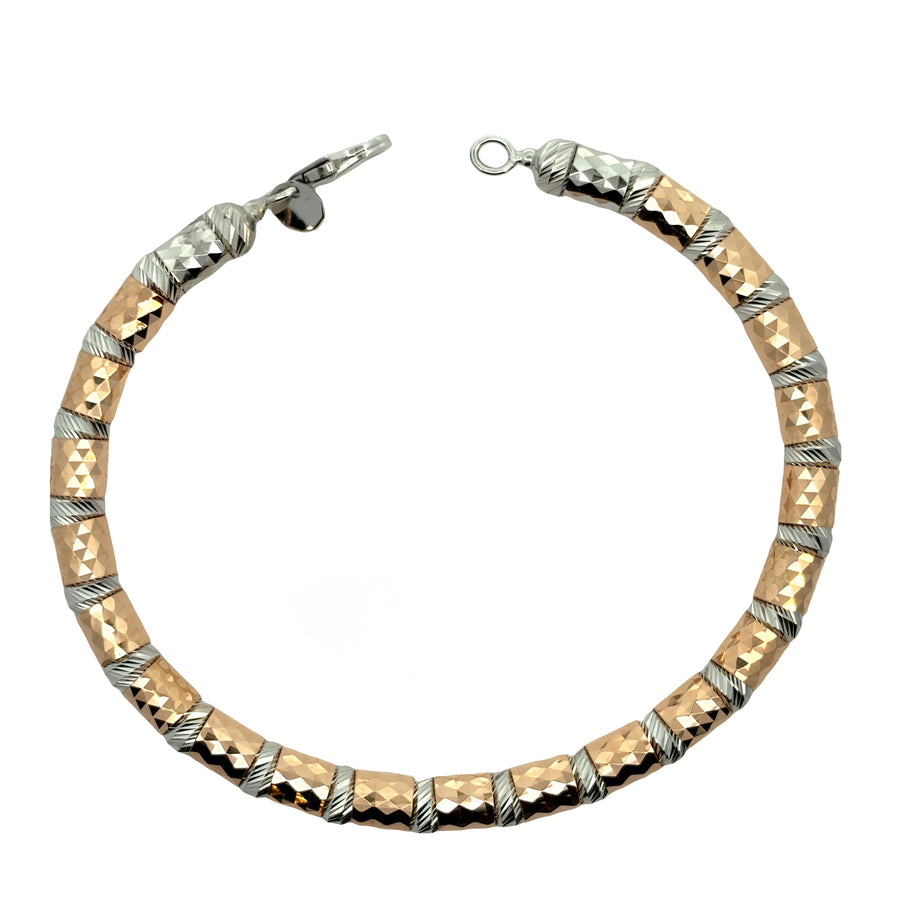 Detailed view of the clasp on two-tone gold bracelet