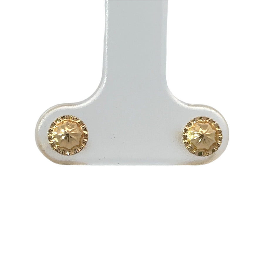 Small cubic zirconia stud earrings crafted in 18k gold