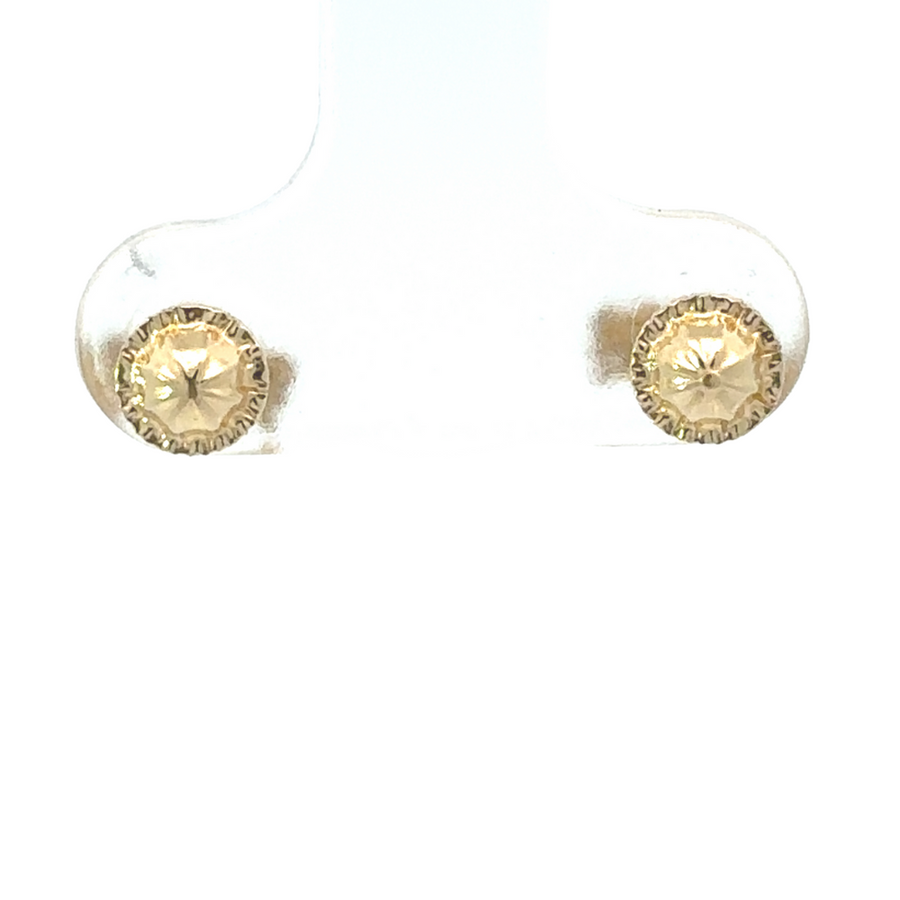 Baby girl with delicate 18k gold crown earrings