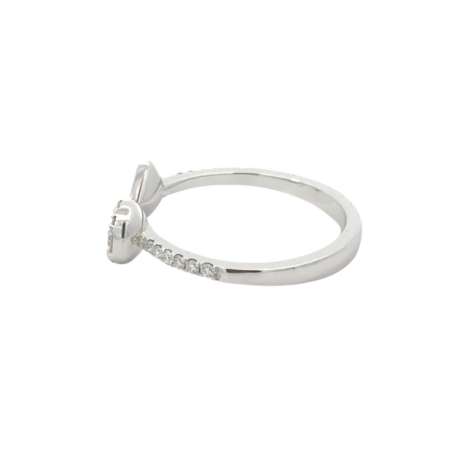 Side view of open gold ring showcasing modern design