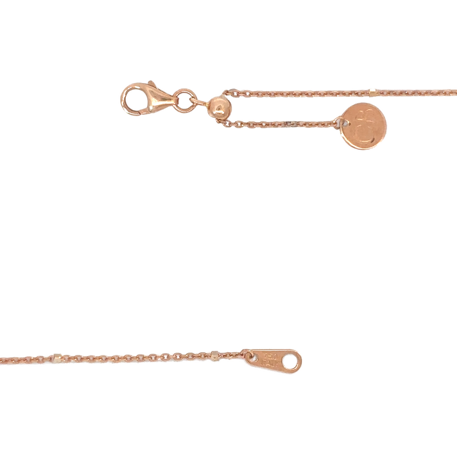 Model wearing the 18k rose gold necklace with an elegant dress