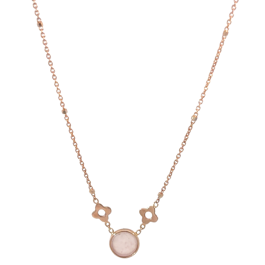 18k rose gold necklace displayed flat on a neutral background