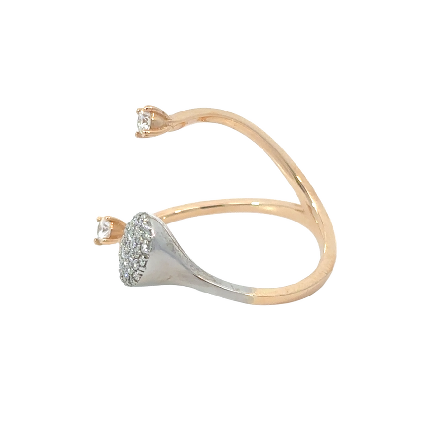 Close-up view of the dual-tone 18k rose and white gold ring with dazzling diamonds