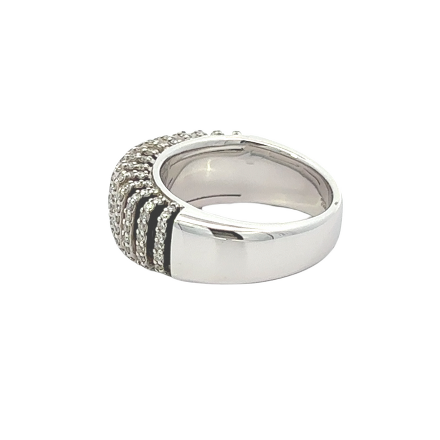 Woman wearing 18k white gold ring with onyx and diamonds, showcasing sophistication