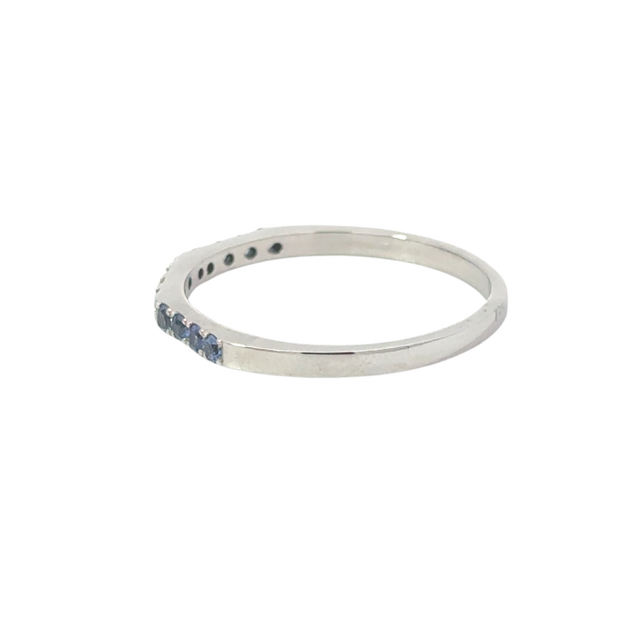 Close-up of sapphire and diamond ring in 18k white gold