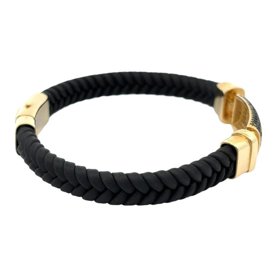 Stylish men’s bracelet featuring gold accents and leather strap