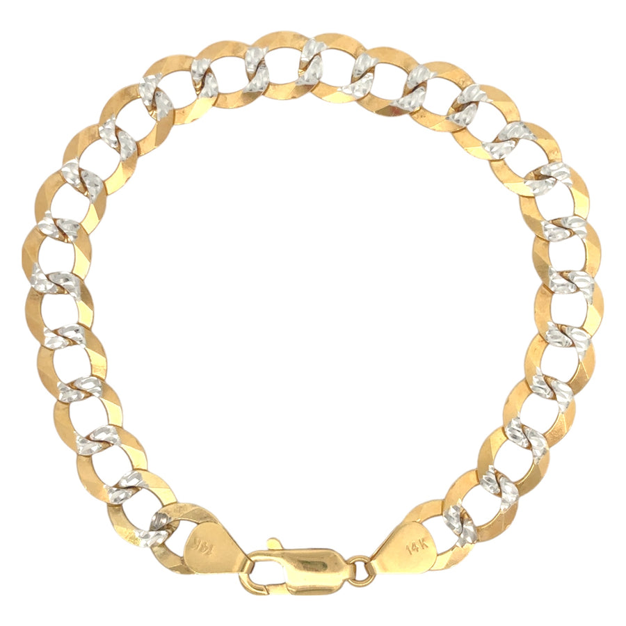 Close-up of men’s gold bracelet with Cuban links