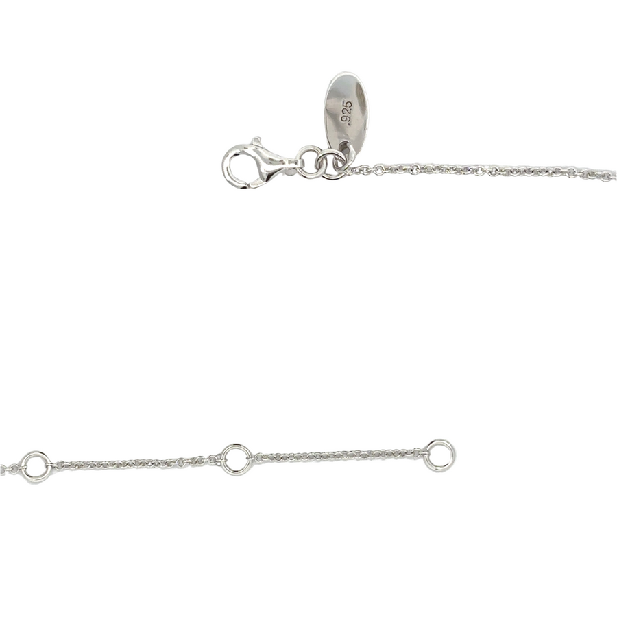 Woman wearing blue pendant necklace at 18-inch length