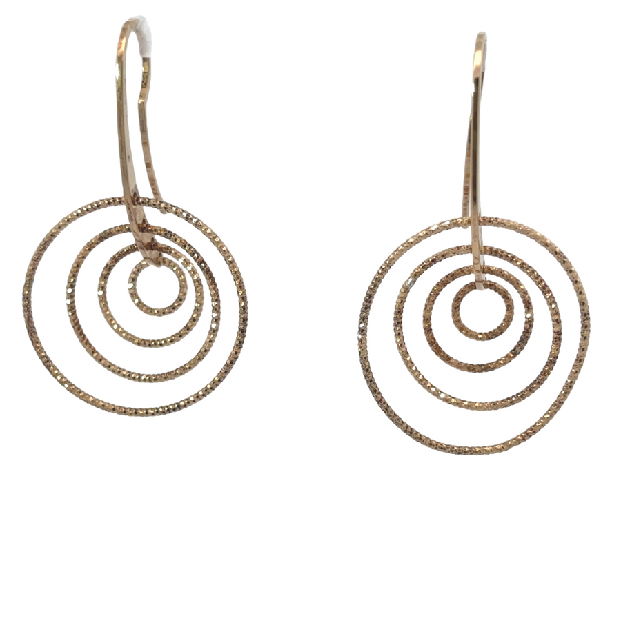 Timeless silver earrings displayed on neutral background