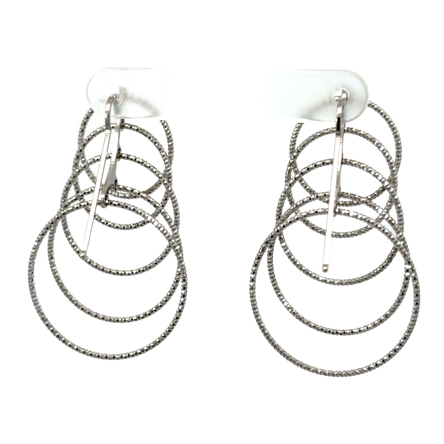 Elegant 925 silver earrings shown with formal outfit