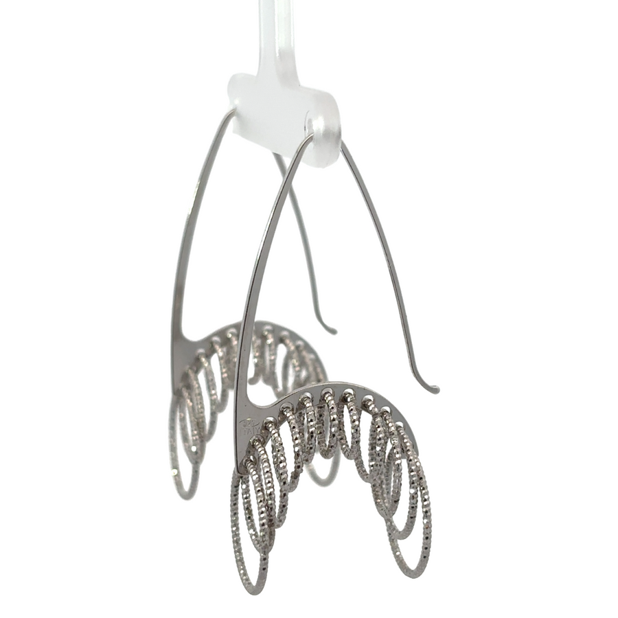 Timeless sterling silver earrings on white background