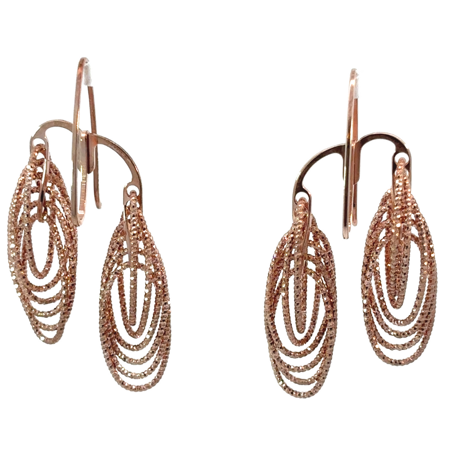 Close-up of diamond-cut detailing on circle earrings